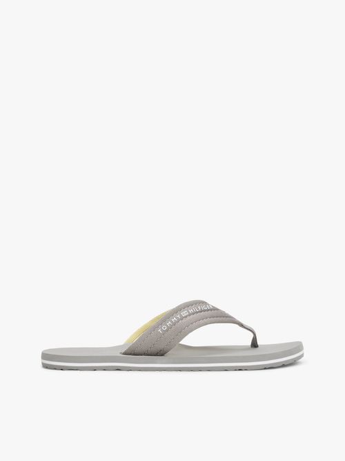 Chancletas-de-tela-trenzada-con-logo