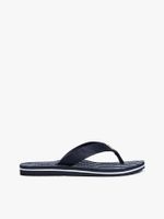 Chancletas-de-tiras-trenzadas-con-monograma-TH