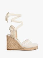 Alpargatas-de-cuña-en-lona-con-flecos