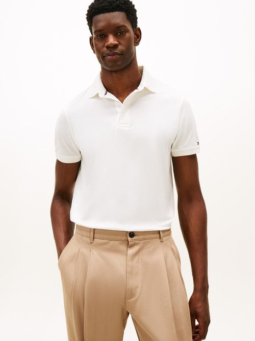 Polo-regular-con-tapeta-oculta-